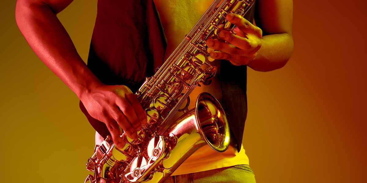 Man playing a saxophone.